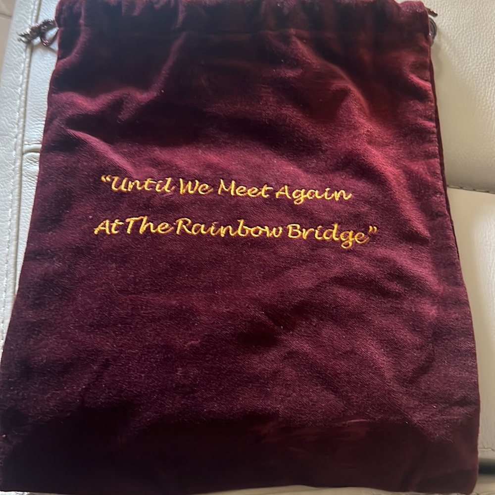 Personalize memorial bag for a pet. They could keep the pets